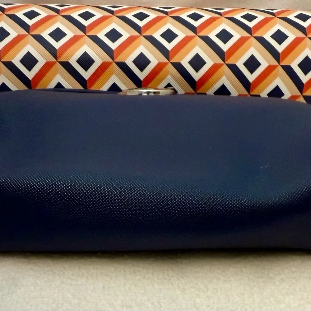 set of three RIKA cosmetic bags.